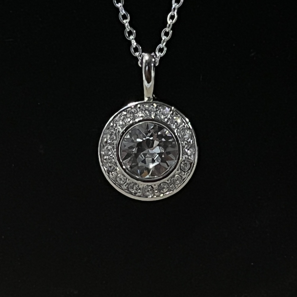 Swarovski crystal pendant necklace with white center stone and crystal bezel